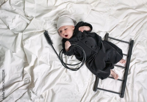 Fotografi Little boy dressed as a chimney sweep