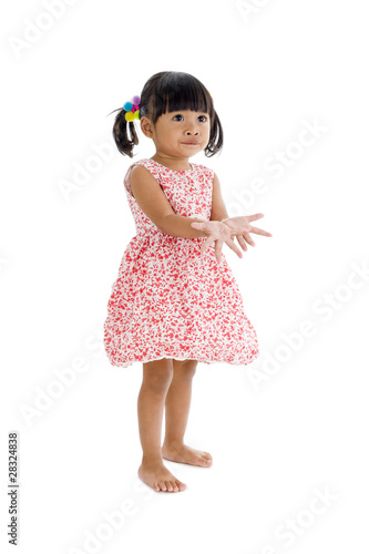 girl trying to catch something