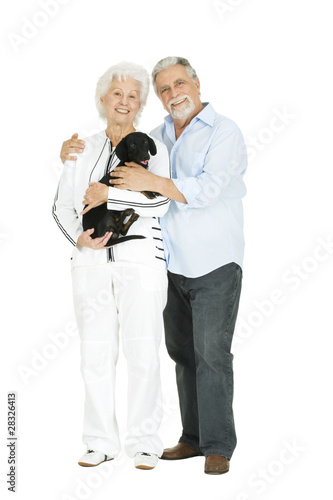elderly couple with a dachshund