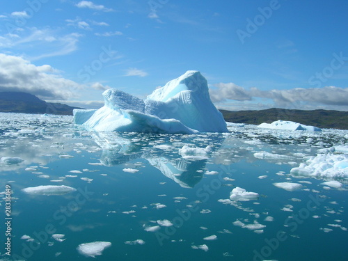 Melting icebergs by the coast of Greenland,