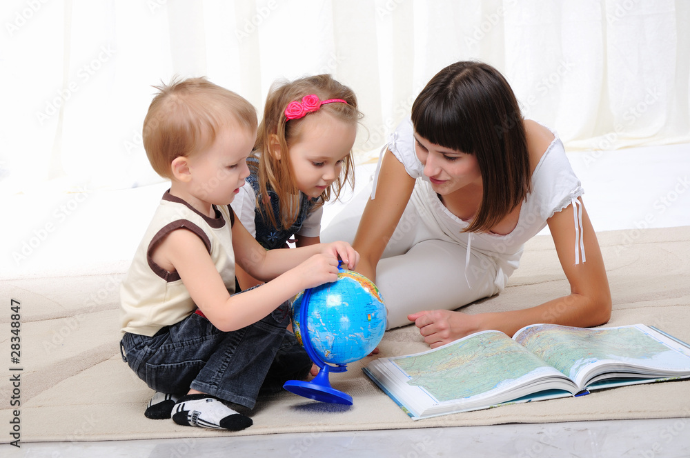 Fototapeta premium young mother, her daughter and young son