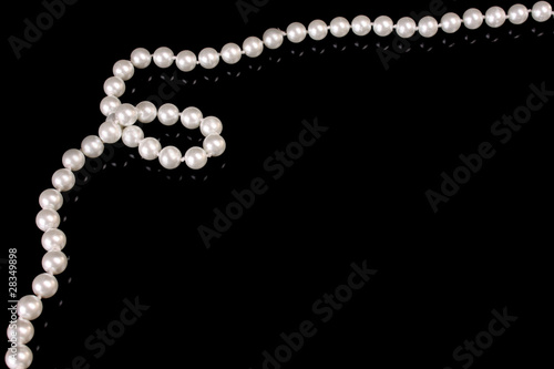 White pearls on  black  background