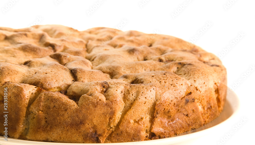whole cinnamon apple pie  on a plate;