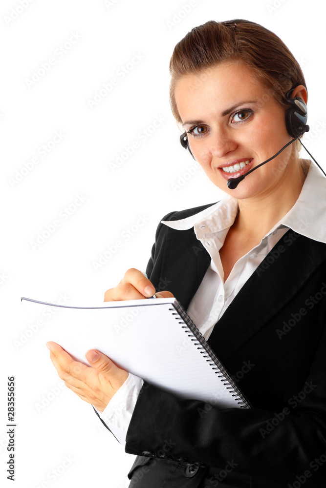 Smiling modern business woman with headset and notebook Smiling modern business woman with headset and notebook