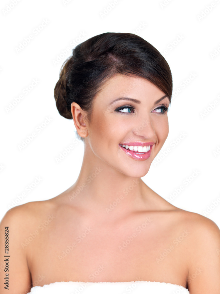 Wrapped in towel woman is smiling Wrapped in towel woman is smiling