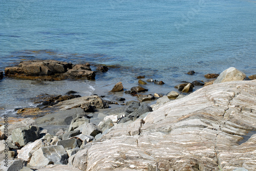 Ocean and the rocks closeup along the coast of Maine