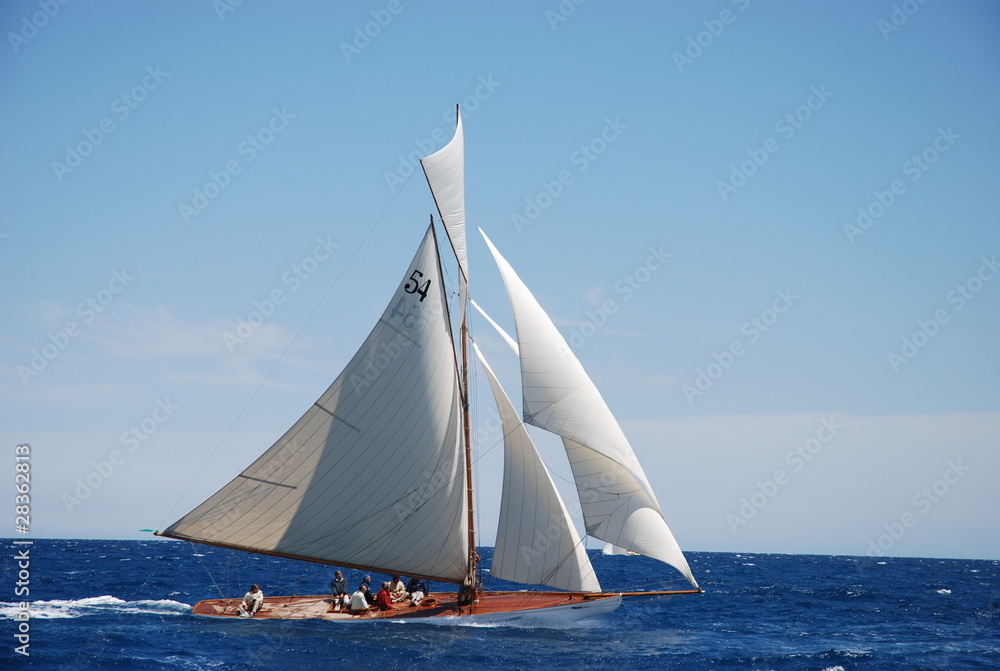classic yacht under full sail sailing in regatta