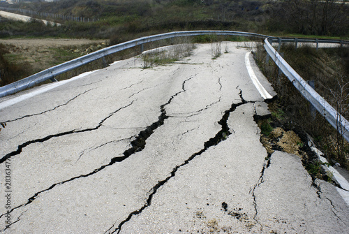 Closed-up cracked asphalt after earthquake