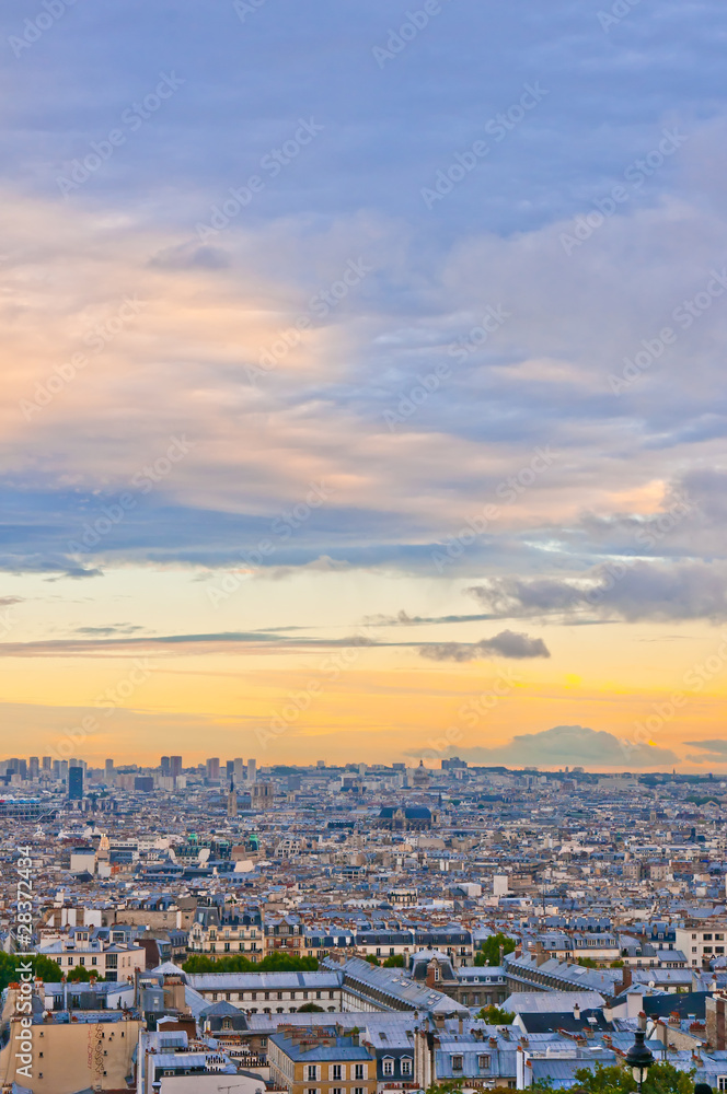 Paris skyline from the Sacre Coeur at a summer sunset.