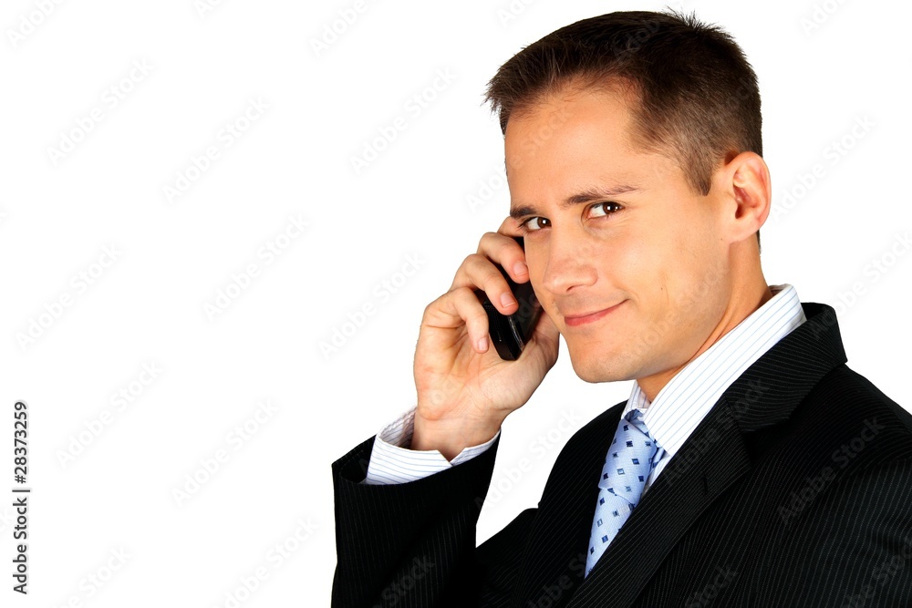 Young handsome business man talking on his smartphone Young handsome business man talking on his smartphone