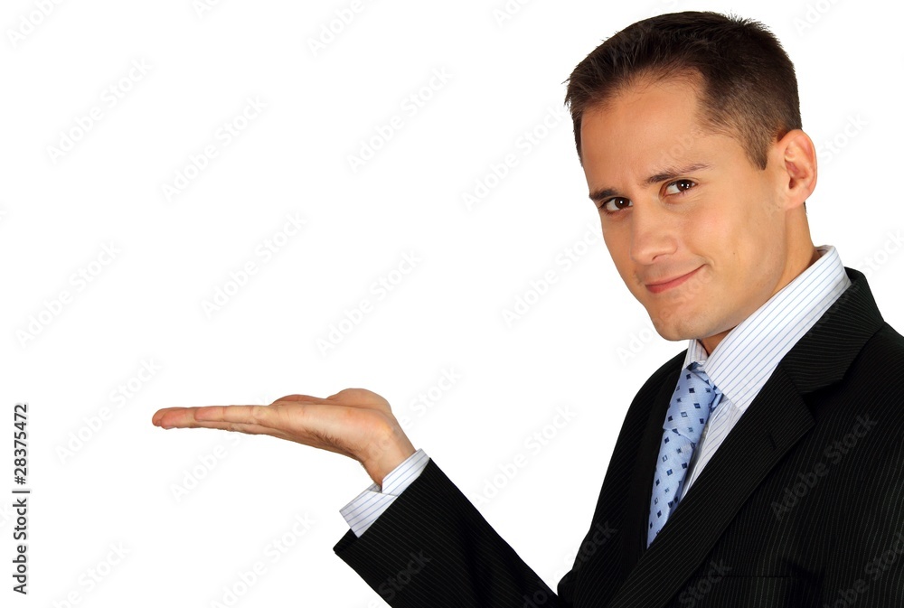 Young handsome business man presenting product Young handsome business man presenting product