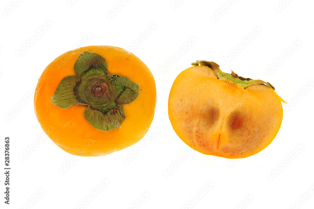 Fresh Persimmon With A Cut Section On White background