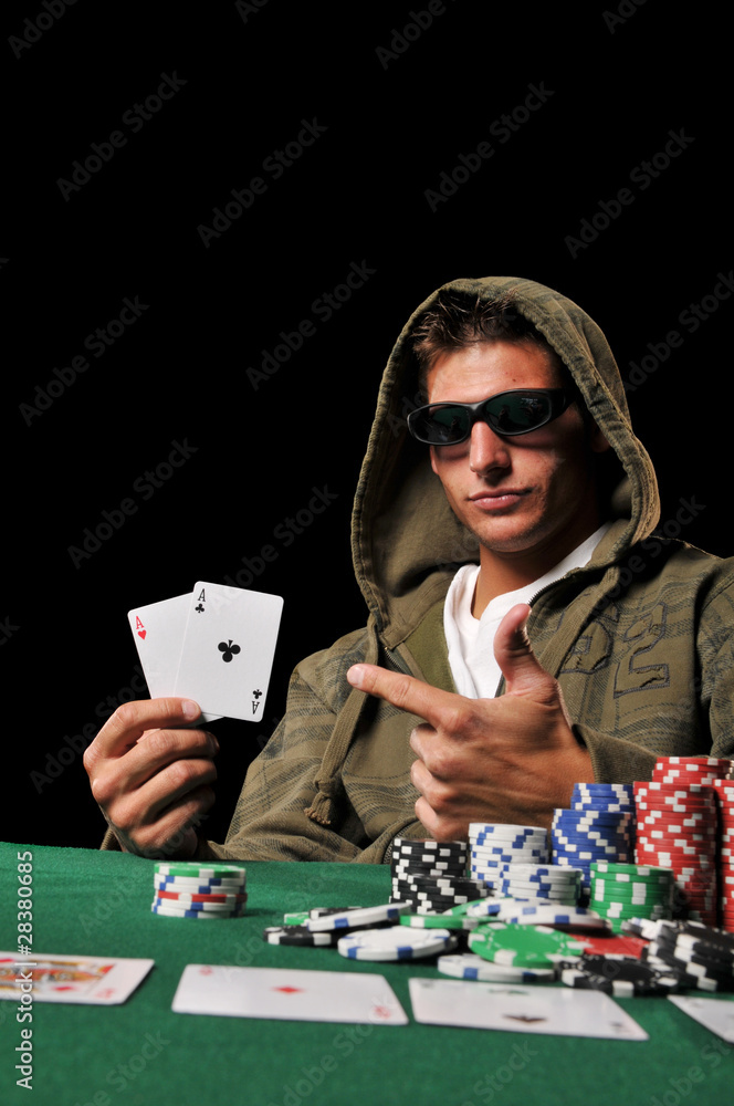 Young man playing poker