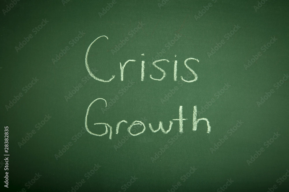 Crisis & growth hand write on chalk board Crisis & growth hand write on chalk board