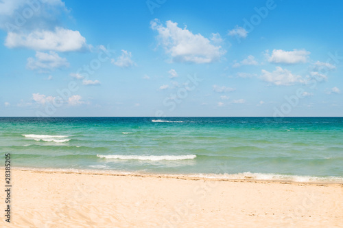 Sand beach on the bright summer day © Elnur
