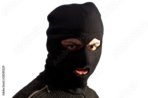 Thief wearing ski mask isolated on white