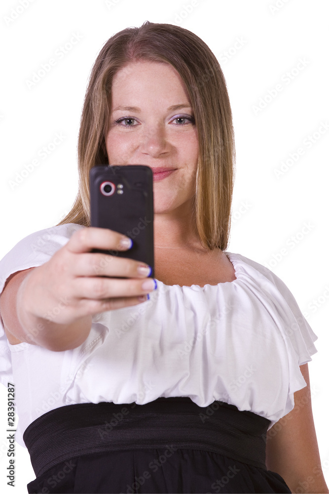 Woman taking pictures from her cell phone Woman taking pictures from her cell phone