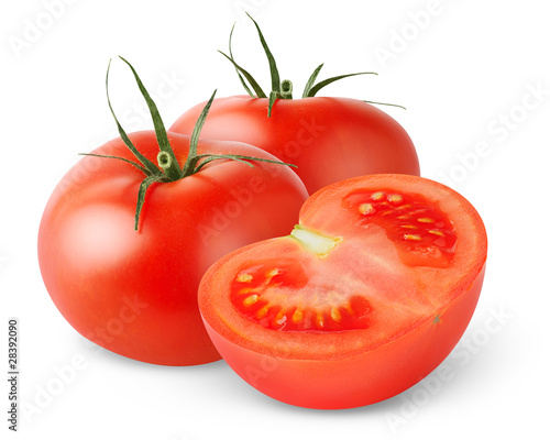 Isolated tomato. Two fresh tomatoes and a half isolated on white background