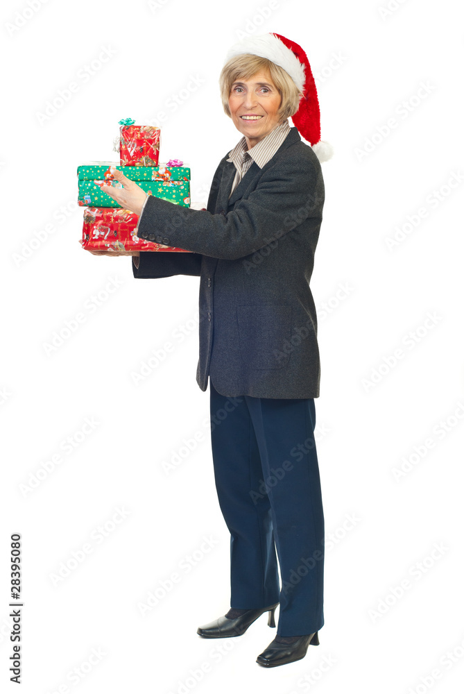 Senior business woman hold Christmas presents Senior business woman hold Christmas presents