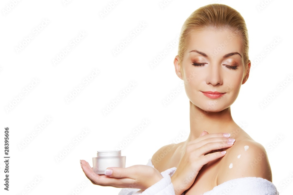Woman applying moisturizer cream on ner body Woman applying moisturizer cream on ner body