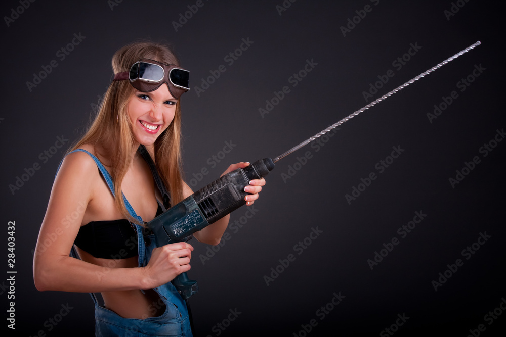 Girl with a drill