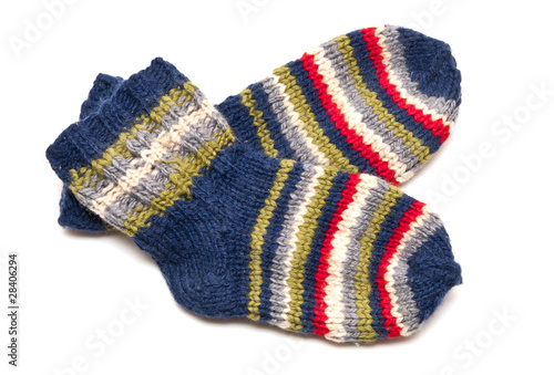 Pair of colorful socks on white background
