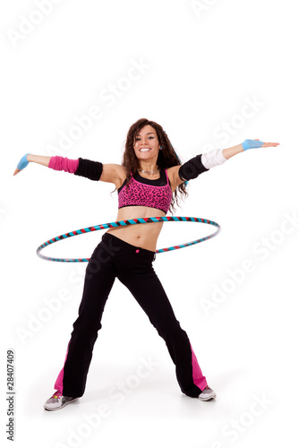 Fitness teacher demonstrating hooping