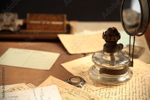 Old correspondence and oil-lamp