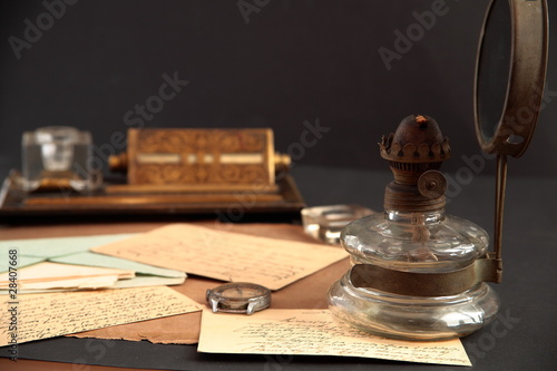 Old correspondence and oil-lamp