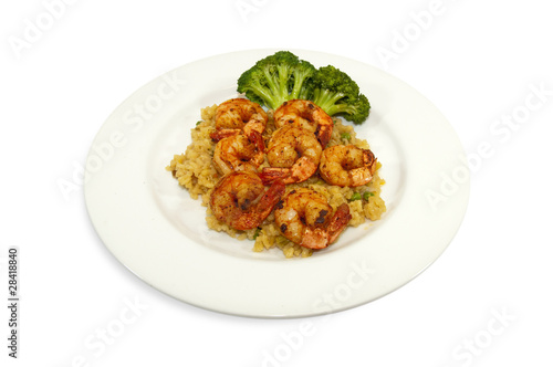 Fried shrimps with rice and broccoli on side