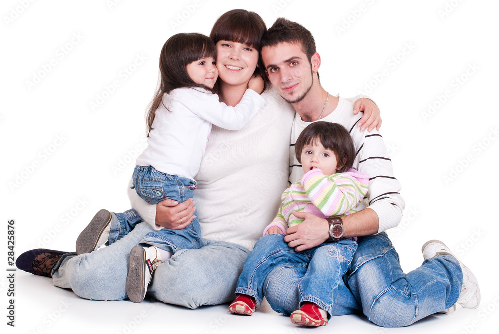 Happiness family with two children isolated on white Happiness family with two children isolated on white