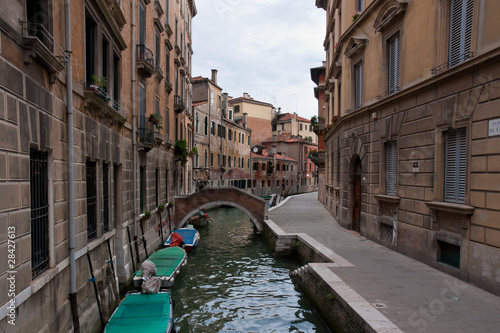 Small bridge over the narrow canal in Venice