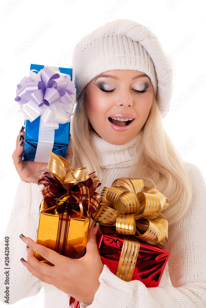 Girl holding a presents on white background Girl holding a presents on white background