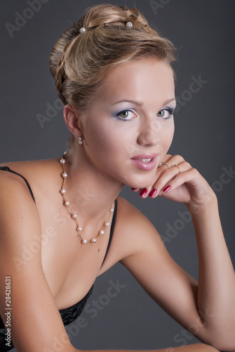 studio portrait of a girl with fashion hair and makeup