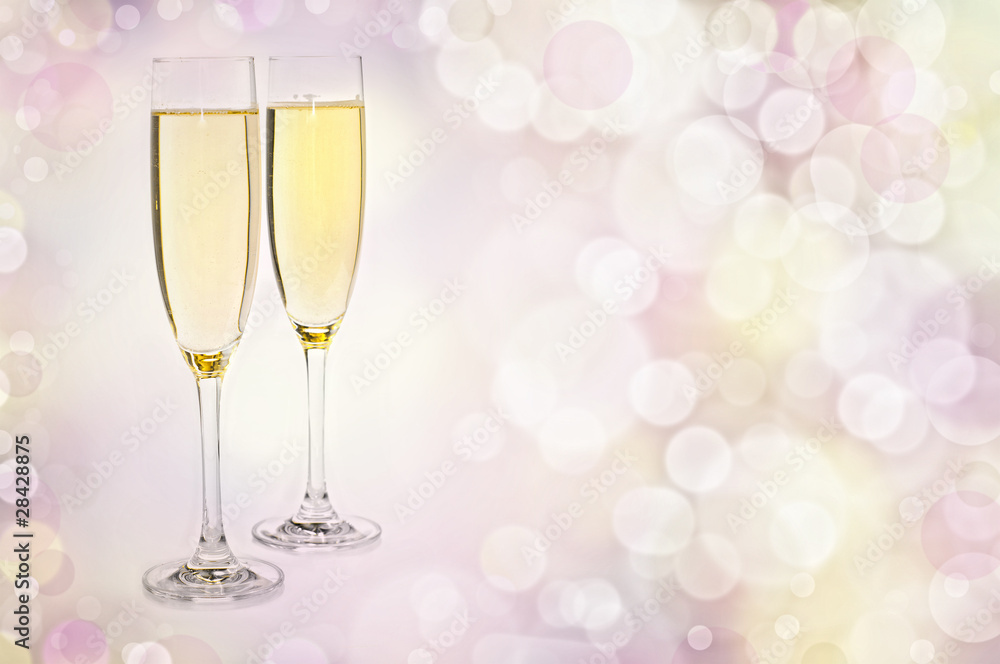 Two Glasses of champagne against golden background Two Glasses of champagne against golden background