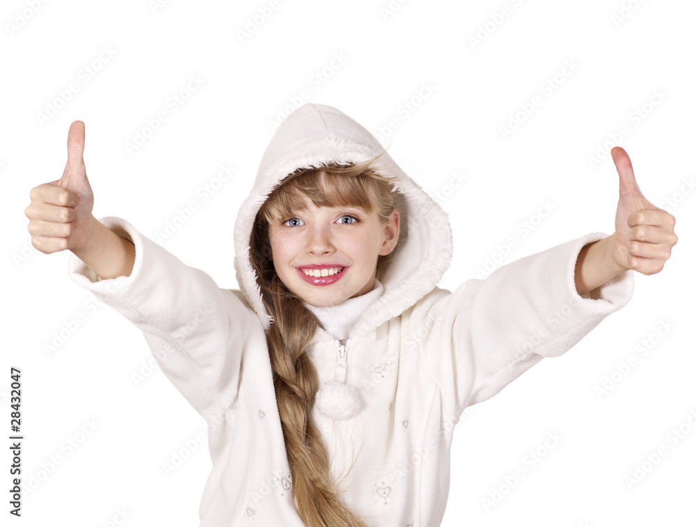 Young girl in winter jacket showing thumb up.