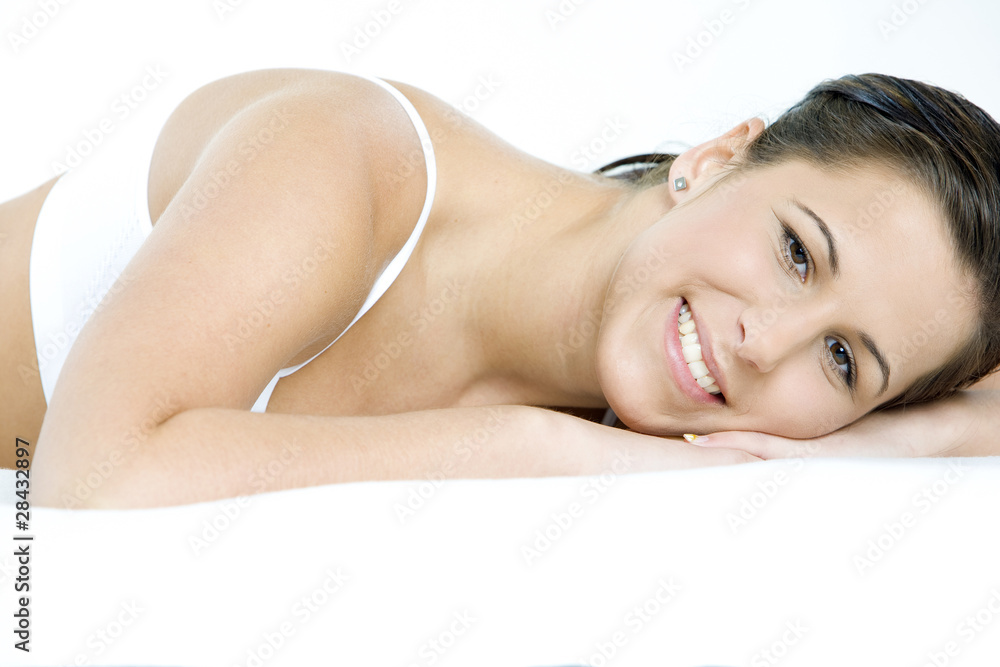 Fototapeta premium portrait of lying down woman