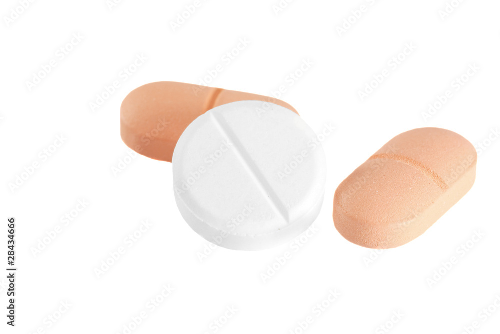 Macro shot of Three tablets on white Macro shot of Three tablets on white
