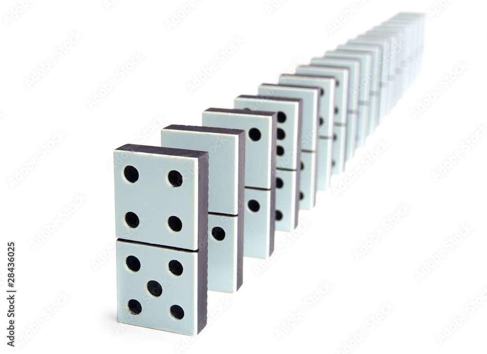 Domino pieces in a line on white background Domino pieces in a line on white background