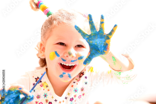 girl with paint hands isolated on white