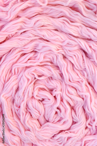 Fototapeta Naklejka Na Ścianę i Meble -  Sphere of pink wool with needles