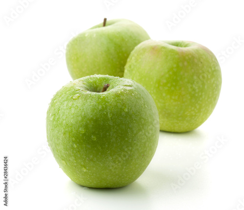 Three ripe green apples