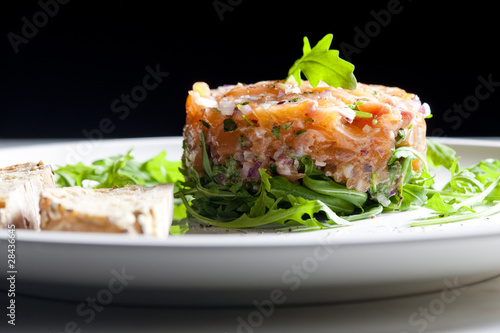salmon tartare with ruccola