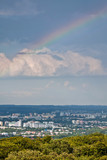 Rainbow over the city after storm