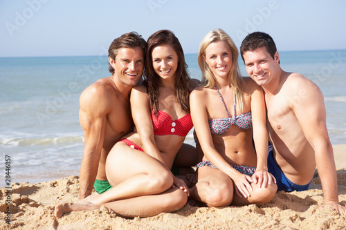 Two young couples on beach holiday