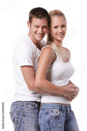 Happy young couple. Isolated over white background.