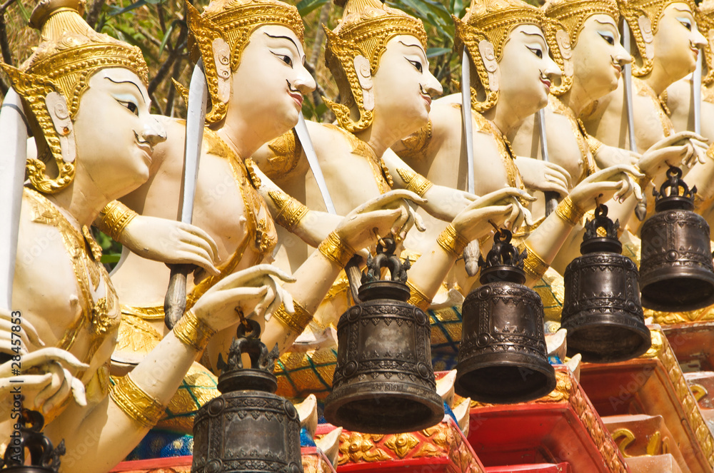 Fototapeta premium Stucco angels with metal bells.