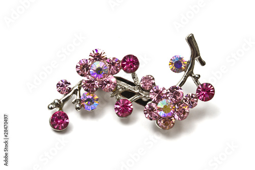 Pink brooch isolated on white Fototapet