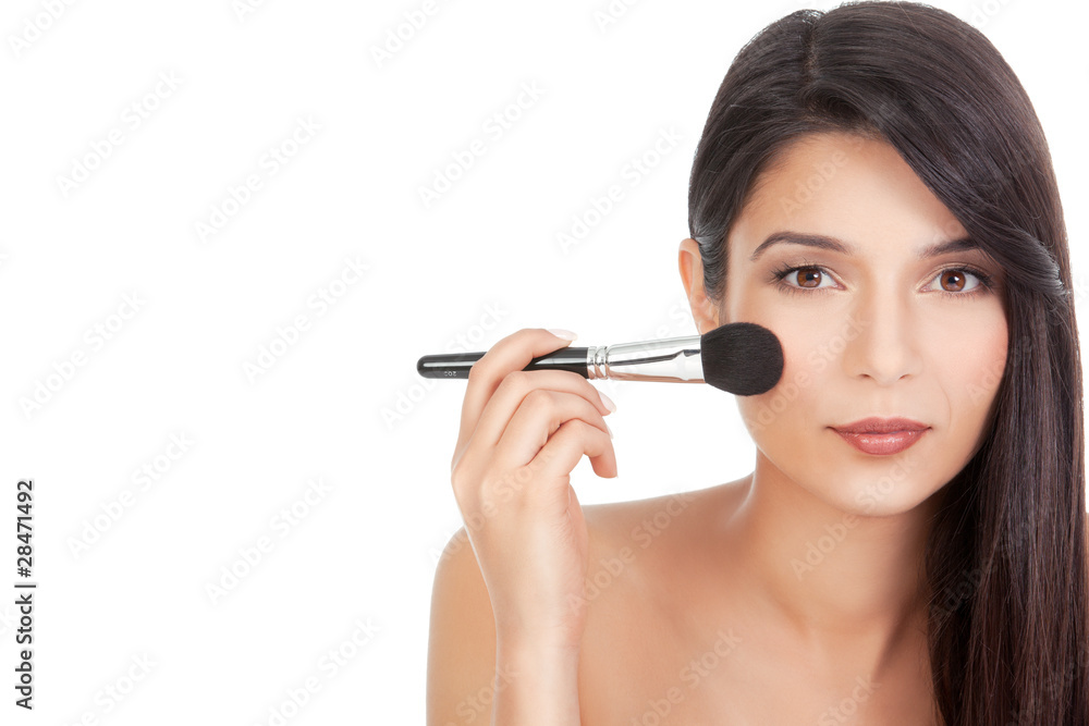 beauty portrait of a young woman applying blush beauty portrait of a young woman applying blush