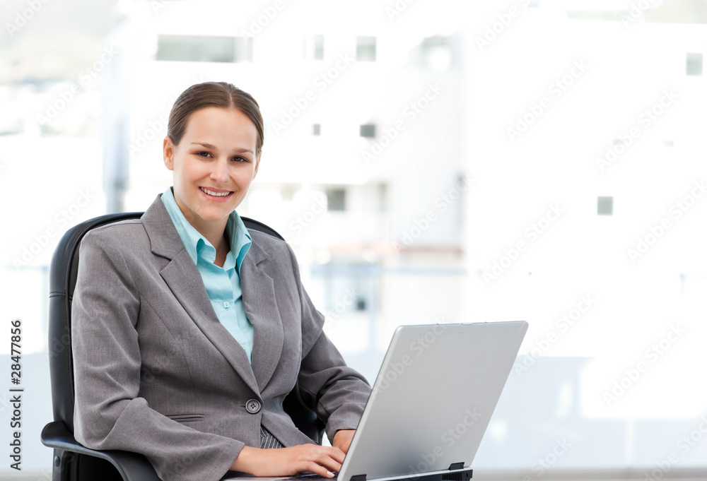 custom made wallpaper toronto digitalYoung manager working on the laptop sitting at her desk